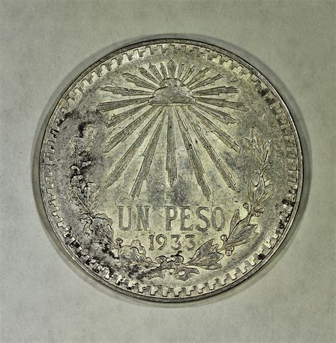 upeso|un peso coin.